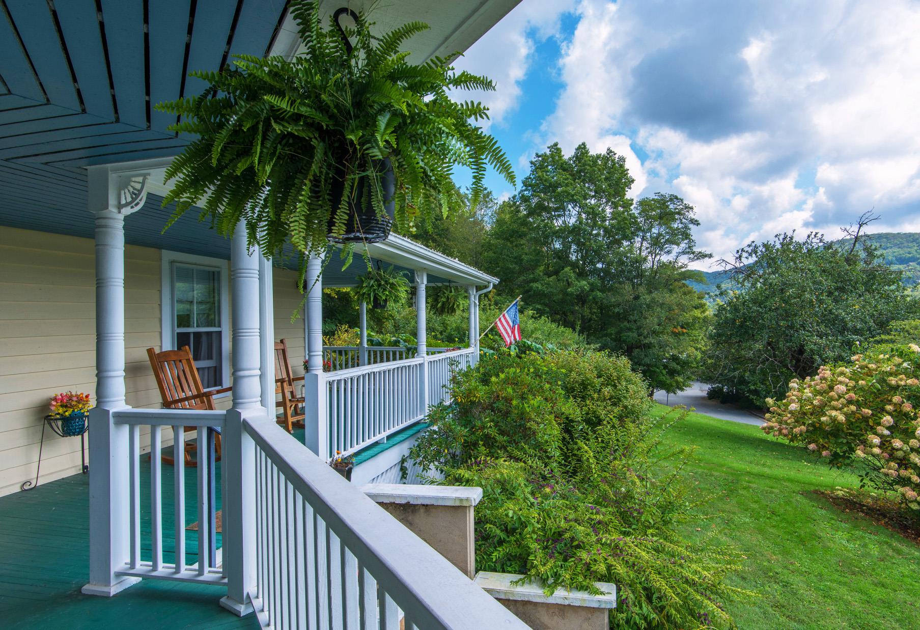 Banner Elk inn front porch and American flag